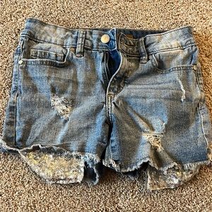 Joe’s Jeans - Jean shorts with sparkle exposed pockets.  Size 14 - runs small